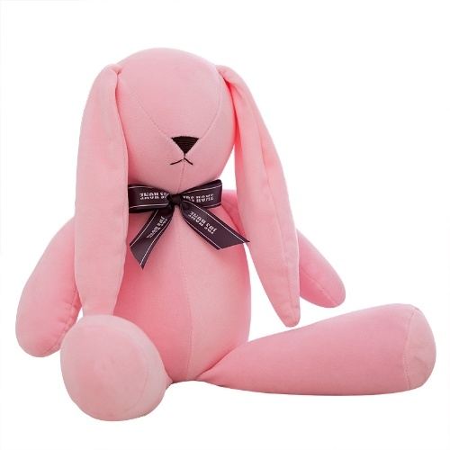 Creativo nuevo juguete de peluche acompañado de muñeca de conejo.
